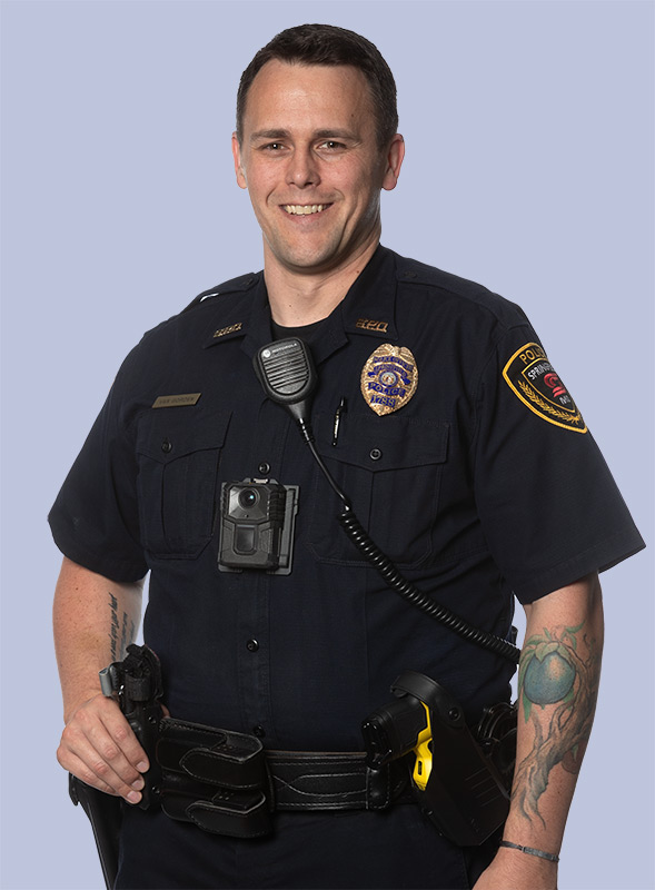 head to waist portrait of officer john van gorden in his police uniform